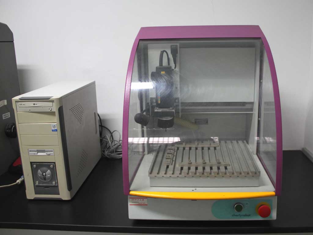 Computer numerical controlled tri-axial milling machine